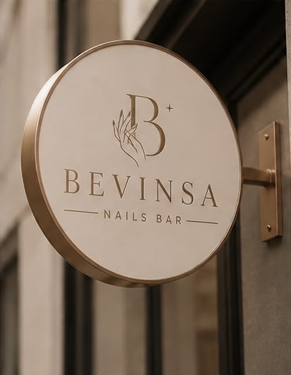 Round hanging BEVINSA sign outside the salon